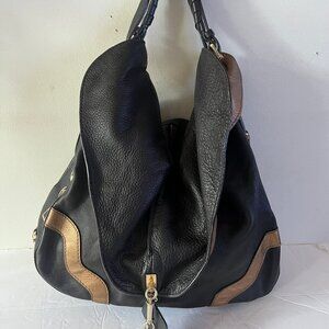 $1295 ANYA HINDMARCH TWO TONE STUDDED LEATHER HOBO
